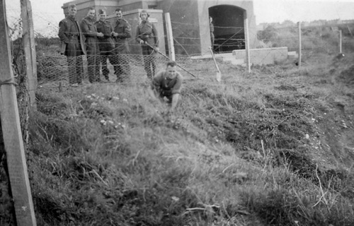 Carefully approaching an unexploded bomb.