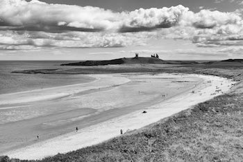 Dunstanburgh Castle seen from Embleton Beach.